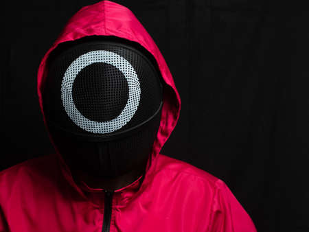 Moscow, Russia- 03 Novemnver 2021: Guard from Squid Game on black background.のeditorial素材