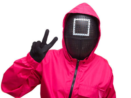 Moscow, Russia- 08 Novemnver 2021: Guard from Squid Game with big with a peace signのeditorial素材
