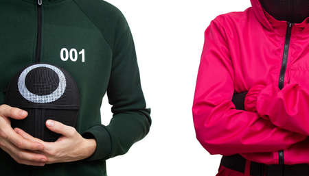 MOSCOW, RUSSIA - NOVEMBER 08, 2021: The player stay together with a guard from Squid game.のeditorial素材