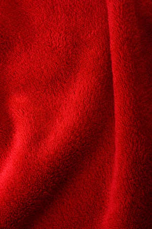 detail of folds in red velvet fabricの写真素材