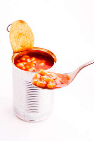 Baked beans spooned from an open canの写真素材