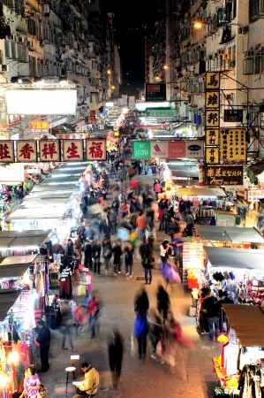 HONG KONG, CHINA - DEC 25, 2012  Crowded people walk through the market on December 25, 2012 in Mong Kok, Hong Kong  Mong Kok, Hong Kong is the highest population density place in the world のeditorial素材