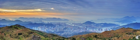 Sunrise in Victoria Harbour and Tsuen Wan, Hong Kong from Tai Mo Shan, the highest hill in Hong Kongの写真素材