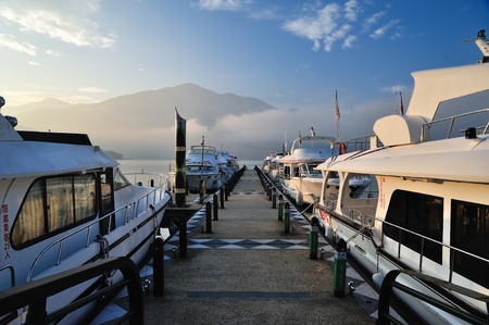 Sunrise in Sun Moon Lake Taiwan with boatのeditorial素材
