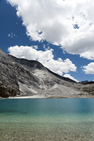 Tibet snow mountain with river in Chinaの写真素材