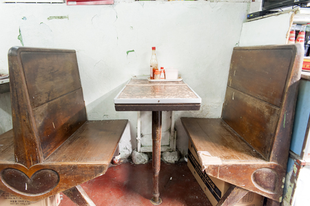 HONG KONG, CHINA - 1st NOV 2016: A Hong Kong local style old restaurant "cha chaan teng" meaning tea restaurant. Located in Cha Kwo Ling, Hong Kong, with over 70 years history. The special style of table inside.の写真素材