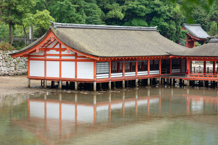 MIYAJIMA, JAPAN - June 27, 2017: Itsukushima Jinja in Miyajima. Present shrine dates from the mid-16th century and believed to follow an earlier design from the 12th centuryのeditorial素材