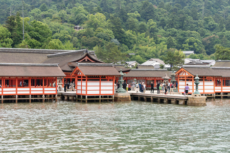 MIYAJIMA, JAPAN - June 27, 2017: Itsukushima Jinja in Miyajima. Present shrine dates from the mid-16th century and believed to follow an earlier design from the 12th centuryのeditorial素材