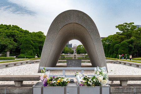 HIROSHIMA, JAPAN - JUEN 27 2017: Memorial Cenotaph in Hiroshima. At the center of the park, a monument covers a cenotaph holds the names of all people killed by the bomb.のeditorial素材