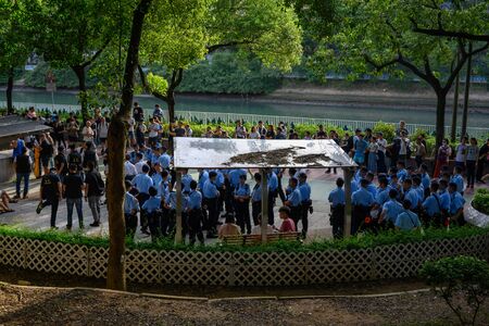 Tuen Mun, Hong Kong - July 6 2019: the crowd protest and occupy the Tuen Mun public park. The protesters took to the streets of Hong Kong to oppose a controversial extradition bill.のeditorial素材