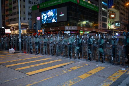 Hong Kong - Aug 3, 2019: Hong Kong August 3 protest which is rejected by police force. Police swearing Street in mong kok.のeditorial素材