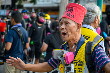 Hong Kong - Sep 21, 2019: Anti-Extradition Law protest at Tuen Mun, approved by Police Force. However, police use Tear gas to disperse the marchのeditorial素材
