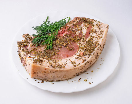 Meat with lard spicy on plate. Isolated.の写真素材