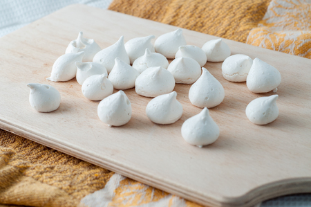 Meringue in the desk on the table.の写真素材