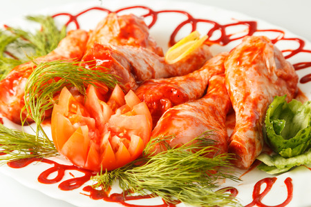 Raw marinade chicken legs with greens. Meat.の写真素材