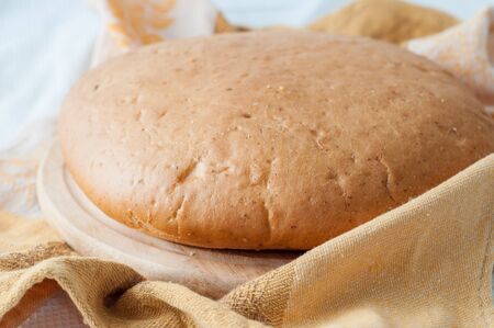 loaf of white ciabatta bread on a table.