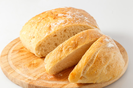 loaf of white ciabatta bread on a table.