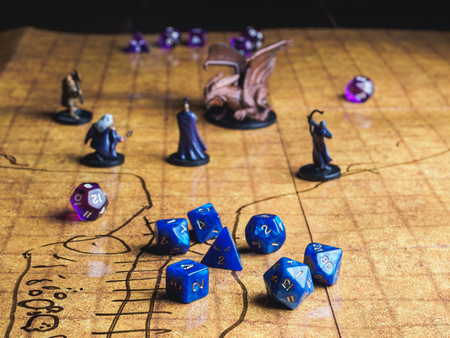 Roleplay game with dragons in dungeon. Yellow field dice.の写真素材