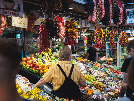 BARCELONA - SEPTEMBER 19: Famous La Boqueria market with vegetables, fruits, meat on September 19, 2017 in Barcelona, Spain.のeditorial素材
