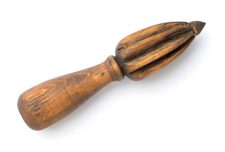 Handcrafted wooden citrus juicer on white isolated background.の写真素材