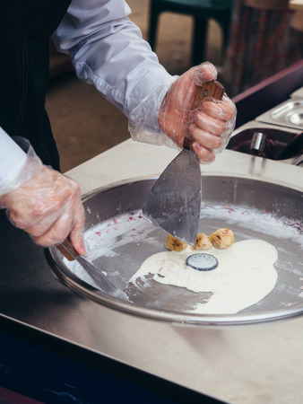 Fried ice cream roll. cooking open kitchen.の写真素材