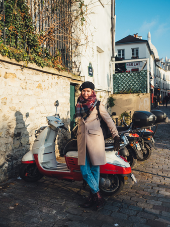 PARIS, FRANCE - JANUARY 17, 2017: Tourists on the street at Momartre district in Paris.のeditorial素材