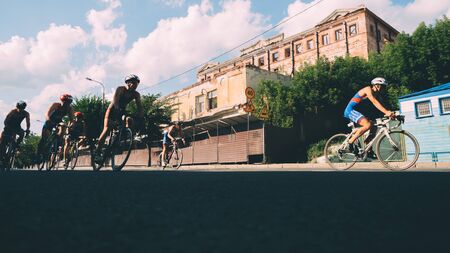 KAZAN, RUSSIA - AUGUST 5, 2018: Last part of triathlon race - by bycicle in the city.のeditorial素材