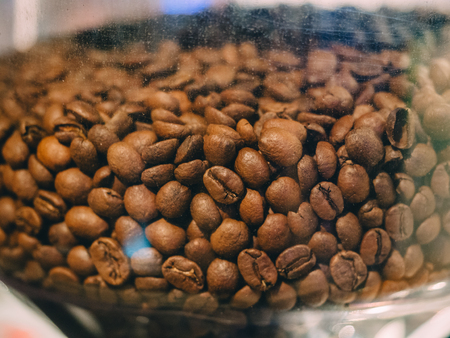 Coffee beans in professional machine in cafe bar restaurant.の写真素材