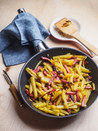 Fried potato with sausage national russian cuisine.の写真素材