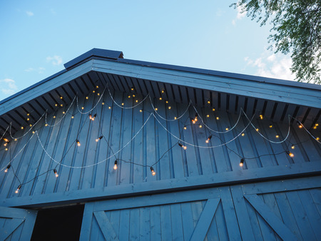 Wedding ceremony with flowers outside in the country garden.の写真素材