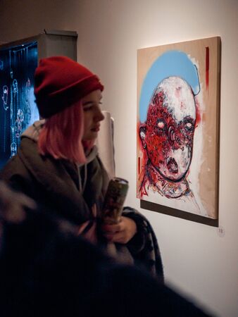 KAZAN, RUSSIA - NOVEMBER 22, 2018. Exhibition of street artist Alesha Art "They only gorge" in Smena.のeditorial素材