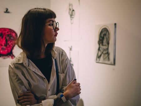 KAZAN, RUSSIA - NOVEMBER 22, 2018. Exhibition of street artist Alesha Art "They only gorge" in Smena.のeditorial素材