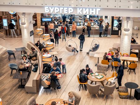 KAZAN, RUSSIA - MAY 5, 2019. MEGA mall shopping center. People in the Delicious Boulevard - food court.のeditorial素材