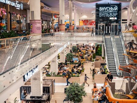 KAZAN, RUSSIA - MAY 5, 2019. MEGA mall shopping center. People in the Delicious Boulevard - food court.のeditorial素材