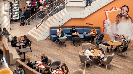 KAZAN, RUSSIA - MAY 5, 2019. MEGA mall shopping center. People in the Delicious Boulevard - food court.のeditorial素材
