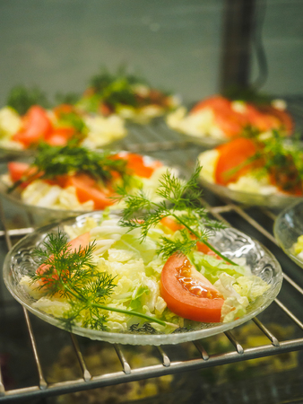 Cuisine cafeteria buffet with food. Self-service food display showcase.の写真素材