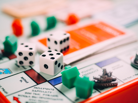 Classic business monopoly board game with dices and field.