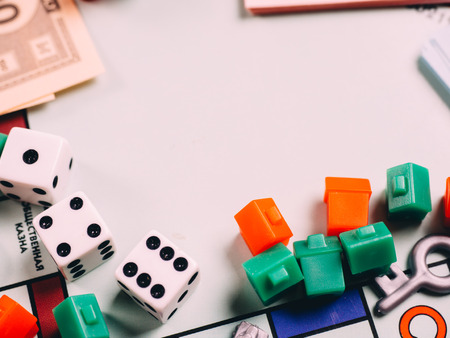 Classic business monopoly board game with dices and field.のeditorial素材