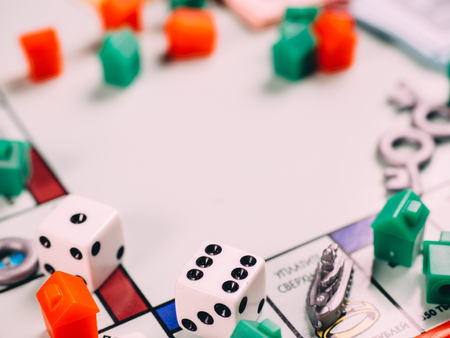 Classic business monopoly board game with dices and field.のeditorial素材