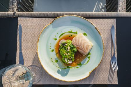 Grilled salmon fillet fish meat with bean puree.