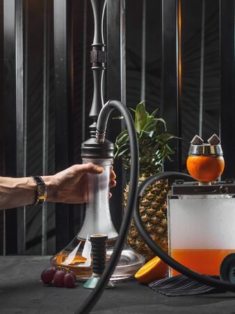 Modern smoky hookah with orange and pineapple.の写真素材