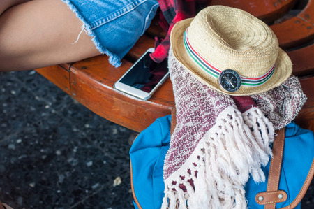 beautiful young asian girl traveling alone at train stationの写真素材