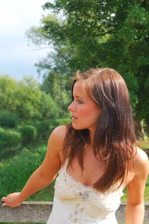 pretty girl in country looking awayの写真素材