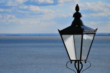 street light with sea in backgroundの写真素材