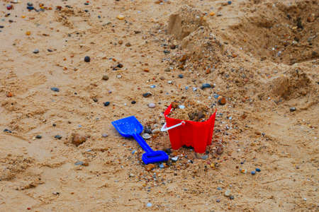 childs bucket and spade by seaの写真素材