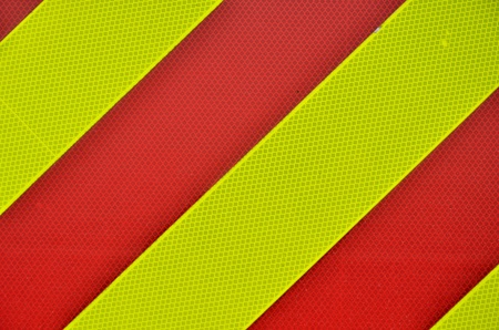Yellow and red diagonal High Visibility Stripesの写真素材