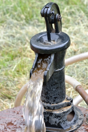 Black iron water pumpの写真素材