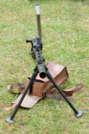 Machine gun pointing to camera