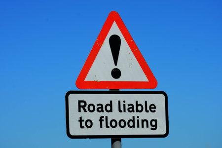 Road liable to flooding signの写真素材