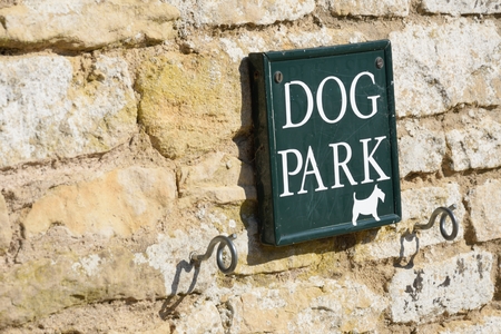 Dog lead hooks on wallの写真素材